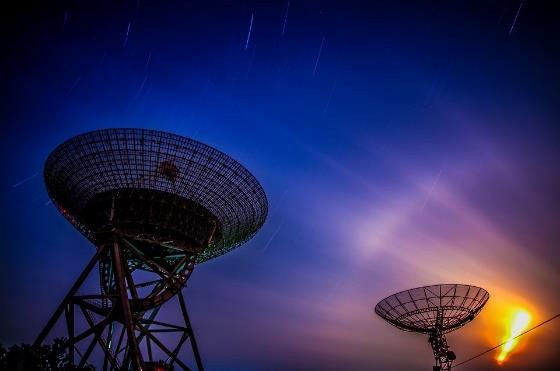 Radar antenna dishes at dusk