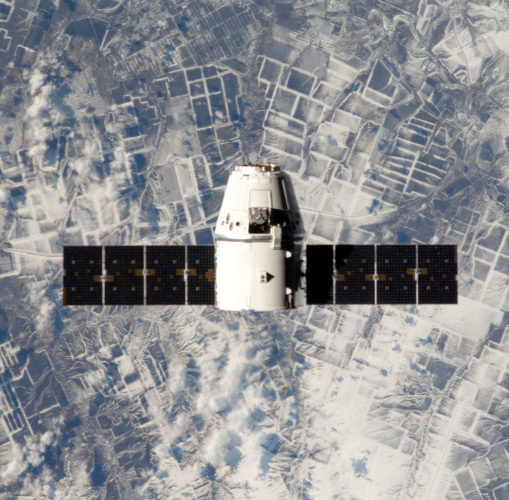 Spacecraft on orbit, representing aerospace and systems-level test